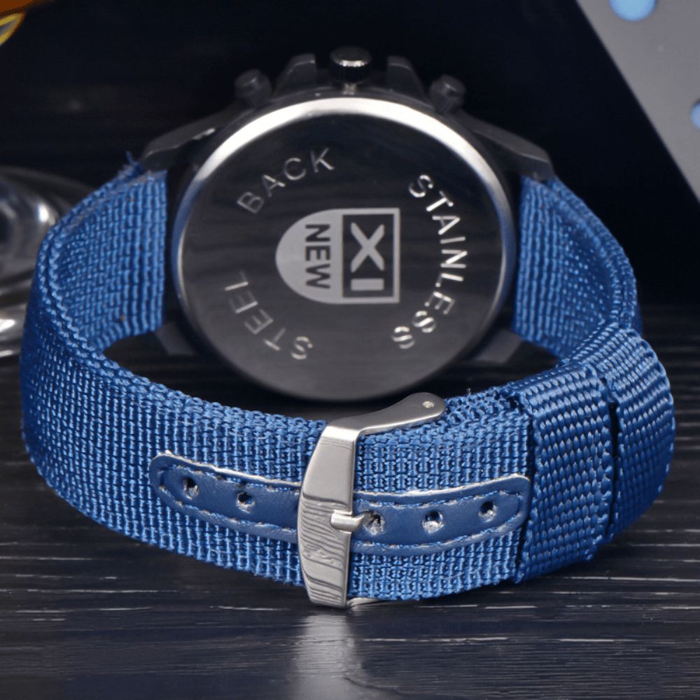 Xinew 2229D Military Casual Herren Nylon Canvas Band Datenanzeige Wasserdicht Großes Zifferblatt Sport Quarzuhr