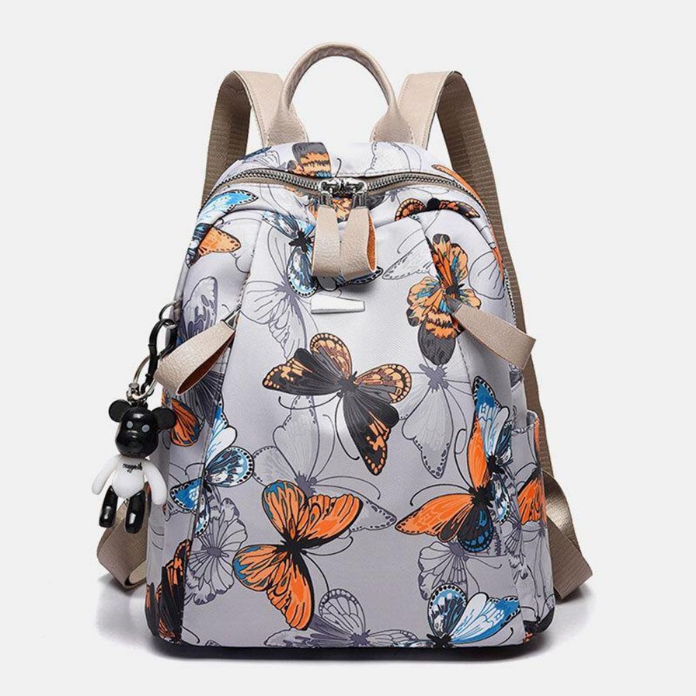 Frauen Oxford Schmetterling Feder Muster Große Kapazität Headset Loch Wasserdicht Anti-Diebstahl Casual Rucksack